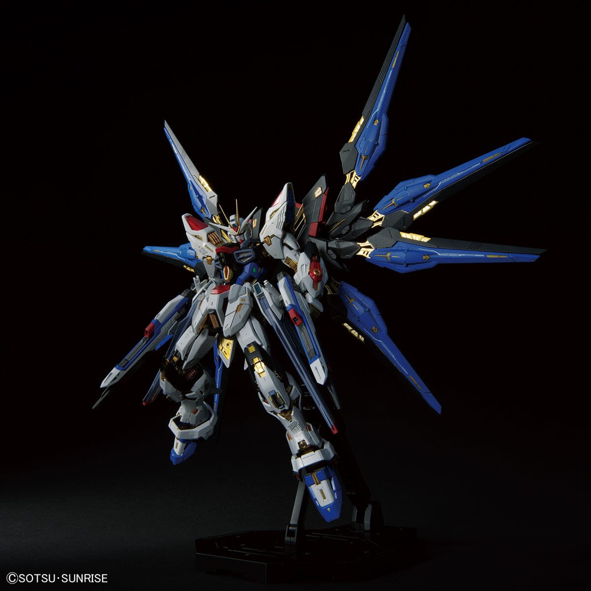Strike Freedom Gundam with its blue wings fully extended